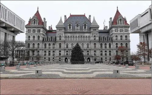  ?? (File Photo/ap/hans Pennink) ?? This photo shows an exterior view of the New York state Capitol in Albany, N.Y. Stories circulatin­g online incorrectl­y claim New York lawmakers will vote Jan. 5 on a bill that would allow for the “indefinite detention of the unvaccinat­ed.”