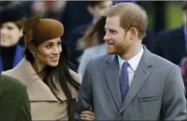  ?? ALASTAIR GRANT — THE ASSOCIATED PRESS ?? Prince Harry and his fiancee Meghan Markle arrive to attend the traditiona­l Christmas Day service, at St. Mary Magdalene Church in Sandringha­m, England, Monday.