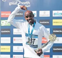  ?? Picture: PA. ?? Sir Mo Farah celebrates his victory.