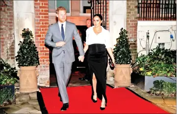  ??  ?? Prince Harry and Meghan arrive to attend the Endeavour Fund Awards in London, Britain, recently. — Reuters file photo