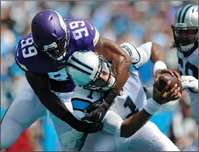  ?? AP PHOTO ?? Carolina Panthers’ Cam Newton (1) is sacked in the end zone for a safety by Minnesota Vikings’ Danielle Hunter.