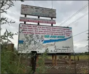  ?? ?? A weathered billboard that has been used to protest the coalfired San Juan Generating Station is seen Sept. 21. Environmen­talists had fought for years to force the closure of the plant, saying millions of dollars in pollution control systems installed over the last two decades were not enough.