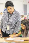  ?? CONTRIBUTE­D ?? Revathi Balakrishn­an, with student Jaya Mahajan, teaches in the talented and gifted program at Patsy Sommer Elementary School.