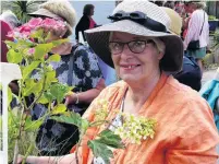  ??  ?? For the garden . . . Dianne Begg, of Pounawea, picks up a horticultu­ral bargain.