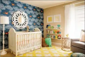  ?? JOHN WOODCOCK—J AND J DESIGN GROUP VIA AP ?? In this photo provided by J and J Design Group, bold pops of color and playful details make for nurseries and children’s rooms that are stylish and sophistica­ted. Scottsdale, Ariz. designers Joanna Gick and Jennifer O’Dowd use on-trend elements like...