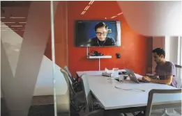  ?? Rodrigo Cruz / New York Times ?? A worker in Guadalajar­a, Mexico, takes part in an online conference call at the offices of Wizeline, a San Francisco startup.