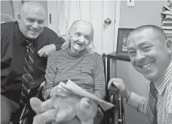  ?? Sullivan County Sheriff’s Office via AP ?? This October 2017 file photo provided by the Sullivan County Sheriff’s Office shows Flora Harris, center, with Sullivan County Sheriff’s Detective Sgt. Ed Clouse, left, and Detective Rich Morgan at an assisted-living residence in Lowell, Mass.