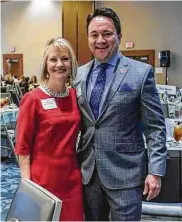  ??  ?? Cindy Hinson (left), HomeAid past president and board member, hosts the 10th annual HomeAid Houston fundraiser, HALO with HomeAid's new executive director Carl Salazar at The Westin Houston Hotel. The event raised $130,000 for HomeAid Houston.