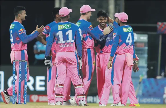  ?? Sportzpics / BCCI ?? Rajasthan Royals debutant Chetan Sakariya, second from right, bowled a tidy spell in a high-scoring match against Punjab Kings