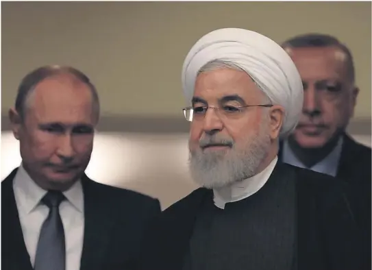  ?? FOTO: AP / NTB SCANPIX ?? I SAMTALER: Russlands president Vladimir Putin, Irans president Hassan Rouhani og Tyrkias president Recep Tayyip Erdogan møttes mandag i Ankara for å diskutere Syria.