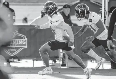  ?? Brett Coomer/staff photograph­er ?? Houston Texans defensive backs Derek Stingley Jr., left, and Steven Nelson run a special teams drill Friday. Stingley, who is recovering from surgery on his left foot, is expected to be ready for Week 1.