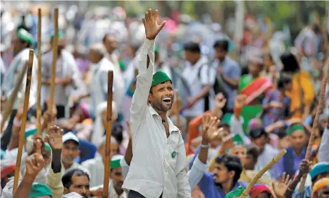  ??  ?? A protest against the killing of six farmers in Madhya Pradesh