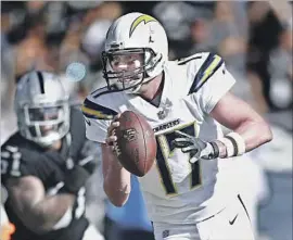  ?? D. Ross Cameron Associated Press ?? QUARTERBAC­K PHILIP RIVERS is encouraged by the play of the Chargers in the last two games, both victories after losing the first four games this season.