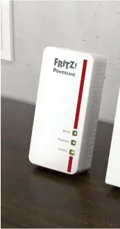  ?? ?? Das Fritz! Powerline 1260E-set von AVM sorgt für erweiterte­s WLAN über die Stromleitu­ng.