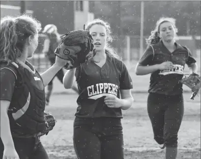  ?? Photo by Jerry Silberman / risportsph­oto.com ?? Cumberland catcher Emily Anderson (left), pitcher Jocelyn Bodington (center) and third baseman Maddi Leite (right) will lead the No. 6 Clippers into a losers’ bracket game Saturday at East Providence after a 6-0 defeat to Coventry Thursday.