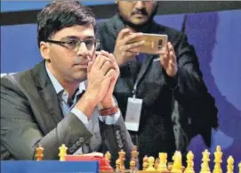  ?? SAMIR JANA/HT PHOTO ?? Viswanatha­n Anand will have a chance to avenge his loss to SS Ganguly, on Tuesday.