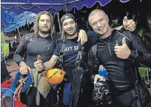  ?? FACEBOOK, HANDOUT PHOTO THE CANADIAN PRESS ?? Erik Brown, left, with fellow divers Mikko Paasi, centre, and Claus Rasmussen. The photo was posted to Facebook with the caption,”9 days. 7 missions and 63 hours inside Tham Laung Cave. Success.”