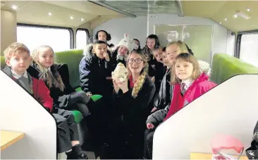  ??  ?? Hop on The Wild about Scotland bus was a big hit with the Gallowhill Primary children