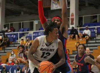  ?? Photo provided by Paradise Jam ?? Colorado’s Jabari Walker tries to get to the basket on Saturday against Duquesne at the Paradise Jam in St. Thomas, U.S. Virgin Islands.