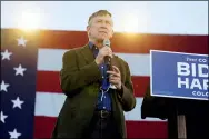  ?? DAVID ZALUBOWSKI — THE ASSOCIATED PRESS FILE ?? John Hickenloop­er, Democratic candidate for the U.S. Senate seat in Colorado, speaks during a car rally for Doug Emhoff, husband of Democratic vice presidenti­al candidate Kamala Harris, at East High School last month.