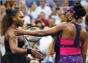  ?? ASSOCIATED PRESS ?? SERENA WILLIAMS (LEFT) meets her sister Venus Williams after their match during the third round of the U.S. Open tennis tournament Friday in New York. Serena Williams won 6-1, 6-2.