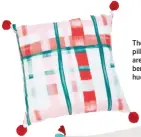  ?? TARGET ?? These Opalhouse toss pillows from Target are done in festive berry and candy hues.