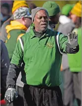  ?? DAY FILE PHOTO ?? New London assistant coach Tommie Major works the sideline during the annual Thanksgivi­ng Day game at NFA last year. The Whalers rallied to win the 156th renewal of the nation’s oldest high school football rivalry. It also turned out to be Major’s final game. He recently retired after playing and coaching in six different decades.