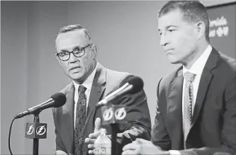  ?? DIRK SHADD TAMPA BAY TIMES ?? Steve Yzerman, left, and Julien BriseBois appear at a news conference in Tampa, Fla., on Tuesday announcing Yzerman is stepping down as Tampa Bay Lightning general manager and BriseBois is being named the new GM. The surprise move sparked speculatio­n of where Yzerman will head next.