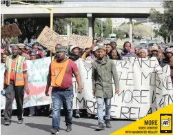  ?? PICTURE: SISONKE MLAMLA ?? ANGRY RESIDENTS: Marikana informal settlement residents marched to hand over a memorandum of demands to the City.