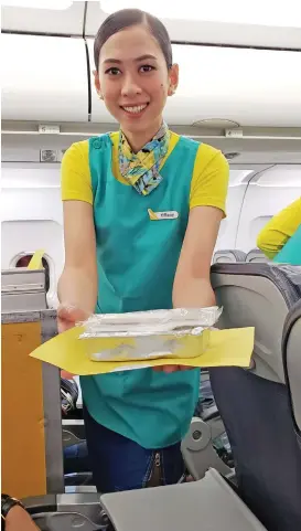  ??  ?? CEBU PACIFIC’S PRE-ORDER MEALS:Chicken Sisig, Beef Pares, Beef Karekare, Fish Escabeche, Shrimp Alfonso Pasta, Chicken Inasal, and Ube Langka Croissant