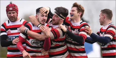  ??  ?? Ivan Jacob celebrates with team-mates after scoring a try against Ashbourne on Sunday.