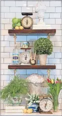  ??  ?? Shelves made from reclaimed wood and the new tiling