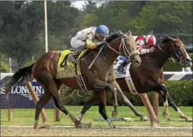  ?? PHOTO COURTESY SPENCER TULIS ?? Forever Unbridled wins the Personal Ensign Stakes.