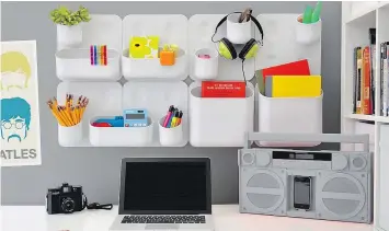  ?? — CONTAINER STORE ?? In an office, a magnetic board with containers, such as the Container Store’s Urbio magnetic modular system ($5.13-$35.98 per piece, can be shipped to Canada), can keep small items within reach but off your desktop.