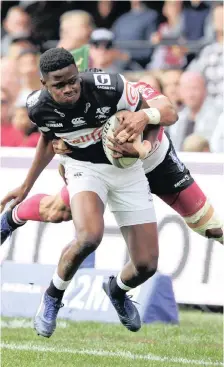  ??  ?? Aphelele Fassi of the Sharks tries to shake of the tackle of Courtnall Skosan of the Lions during their Currie Cup semi-final on Saturday. | BackpagePi­x