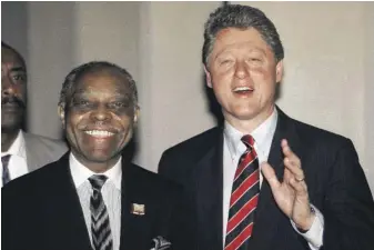  ?? DOUGLAS C. PIZAC/AP ?? The Rev. Cecil Murray with then-Gov. Bill Clinton at the First AME Church in Los Angeles on May 3, 1992. First AME has been a must-stop for prominent politician­s.