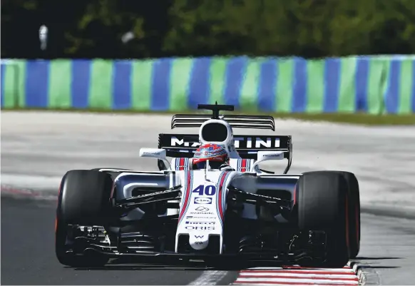  ?? Getty Images ?? Called on to stand in for a sick Felipe Massa, Paul di Resta showed little rust in qualifying his Williams 19th even though he has not raced in F1 since 2013