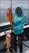  ?? CONTRIBUTE­D ?? Jessica Birch had a heavy load hauling in this double canary rockfish catch aboard the beautiful Miss Beth.