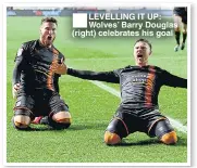  ??  ?? ■
LEVELLING IT UP: Wolves’ Barry Douglas (right) celebrates his goal