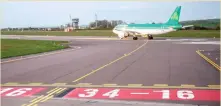  ??  ?? The first flight after the renaming of the main runway at Cork Airport prepares to take off. Photo: Brian Lougheed