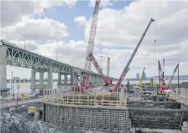  ?? PETER MCCABE / MONTREAL GAZETTE ?? Work on footings alongside the Champlain Bridge in Montreal. The Algoma steel plant has won contracts for about 20 per cent of the new bridge’s steel.