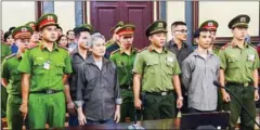  ?? AFP ?? A Vietnamese court on October 5, jailed five activists up to 15 years after finding them guilty of ‘attempting to overthrow the state’.