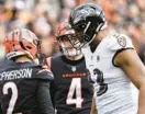  ?? GETTY KIRK IRWIN/ ?? Bengals kicker Evan McPherson talks with Ravens defensive lineman Calais Campbell after a field goal during the first quarter of Sunday’s game in Cincinnati.