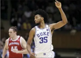  ?? GERRY BROOME — THE ASSOCIATED PRESS ?? Duke’s Marvin Bagley III (35) reacts following a basket against South Dakota during the second half of an NCAA college basketball game in Durham, N.C., Saturday.