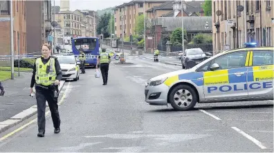  ??  ?? Probe Police in Neilston Road