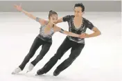  ?? MATTHIAS SCHRADER/ASSOCIATED PRESS FILE PHOTO ?? Ryom Tae-Ok and Kim Ju-Sik of North Korea compete Sept. 28 in Oberstdorf, Germany. They qualified for the Olympics.