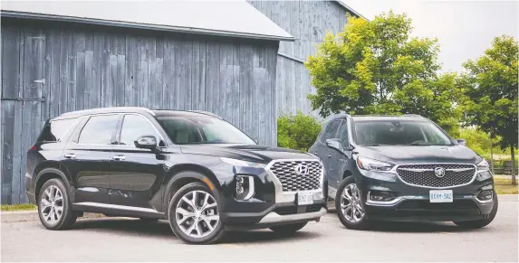  ?? PHOTOS: NICK TRaGIANIS ?? The 2020 Hyundai Palisade, left, and the 2019 Buick Enclave Avenir never feel underpower­ed or overworked, but the Palisade will make your wallet happier.