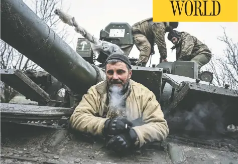  ?? VIACHESLAV RATYNSKYI / REUTERS ?? Servicemen of Ukraine's Carpathian Sich Battalion are seen on a tank on the front line near the town of Lyman, Donetsk region, on Thursday.