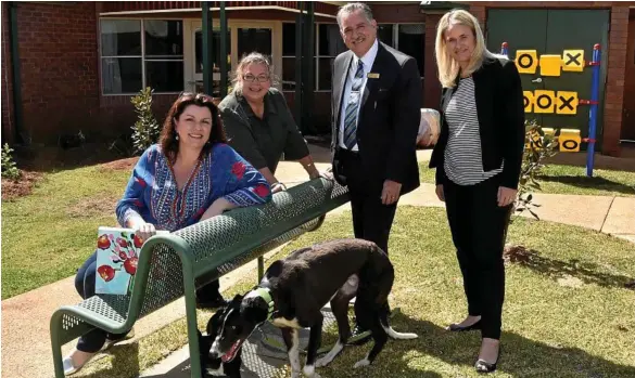  ?? PHOTO: BEV LACEY ?? ENJOYING SUN: Out in the new sensory garden at Mt Lofty Heights Nursing Home are (from left) artist Anna Bartlett, Mt Lofty Heights Nursing Home facility manager Jacinta Pitt, Don Burstow from Burstows Toowoomba, Toowoomba Hospital Foundation CEO...