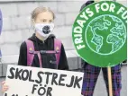  ?? PHOTO: REUTERS ?? Fighting for the future . . . Swedish climate activist Greta Thunberg holds a poster reading ‘‘School strike for Climate’’ as she protests in front of the Swedish Parliament Riksdagen, in Stockholm, Sweden, on September 5.